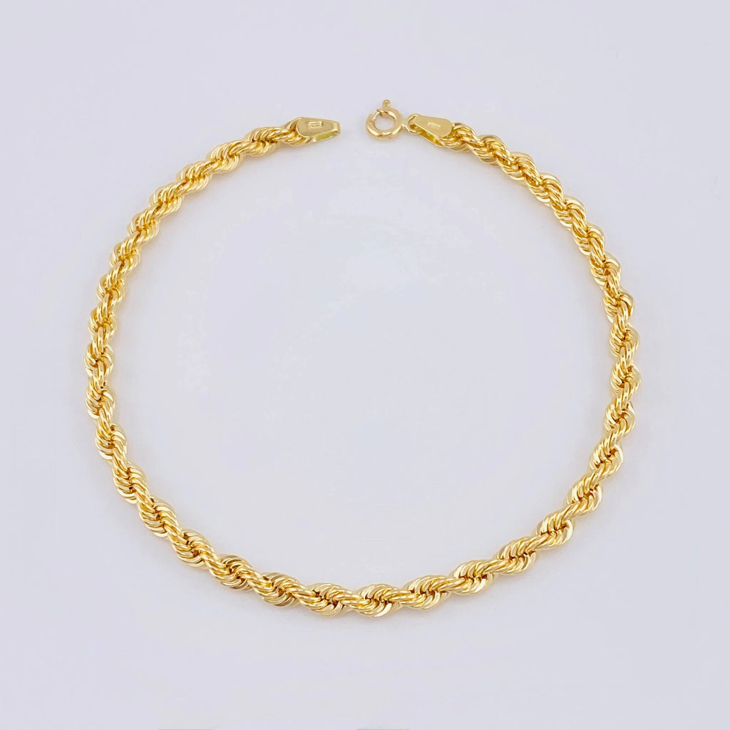 Pulso tejido lazo oro amarillo 18k l 21 cm l 2 gramos