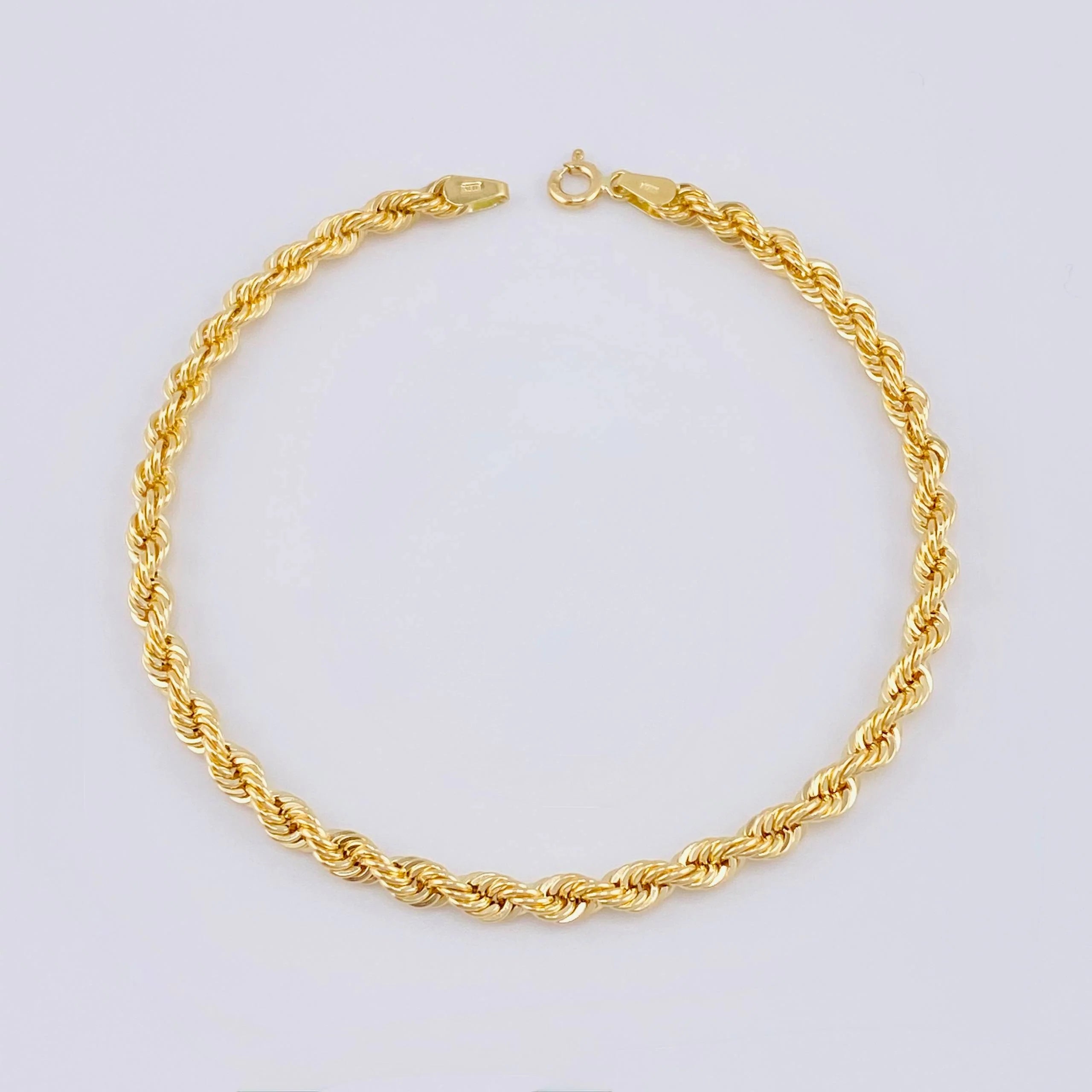 Pulso tejido lazo oro amarillo 18k l 21 cm l 2 gramos