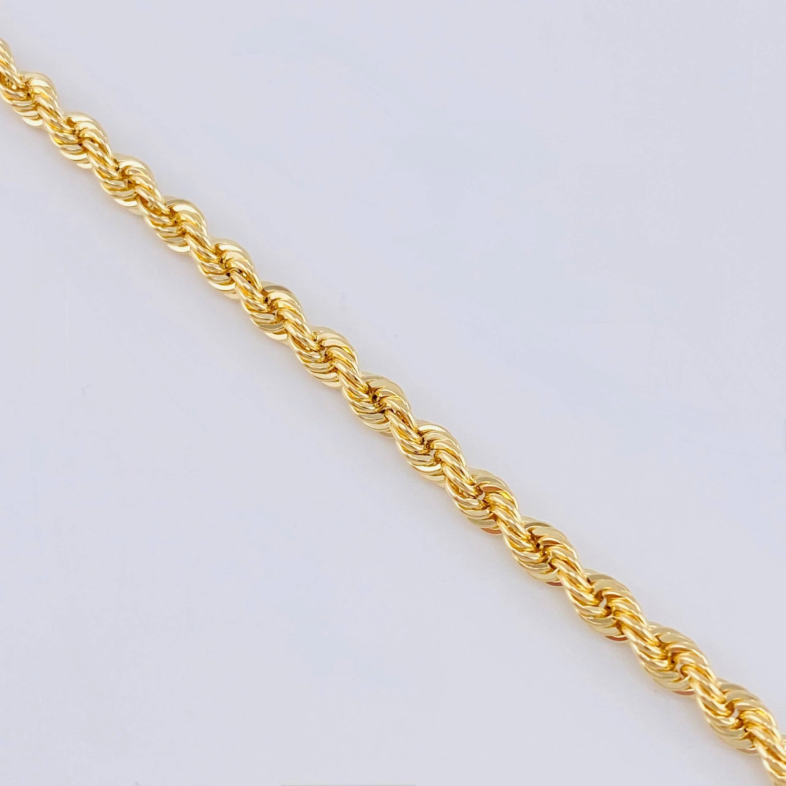 Pulso tejido lazo oro amarillo 18k l 21 cm l 2 gramos